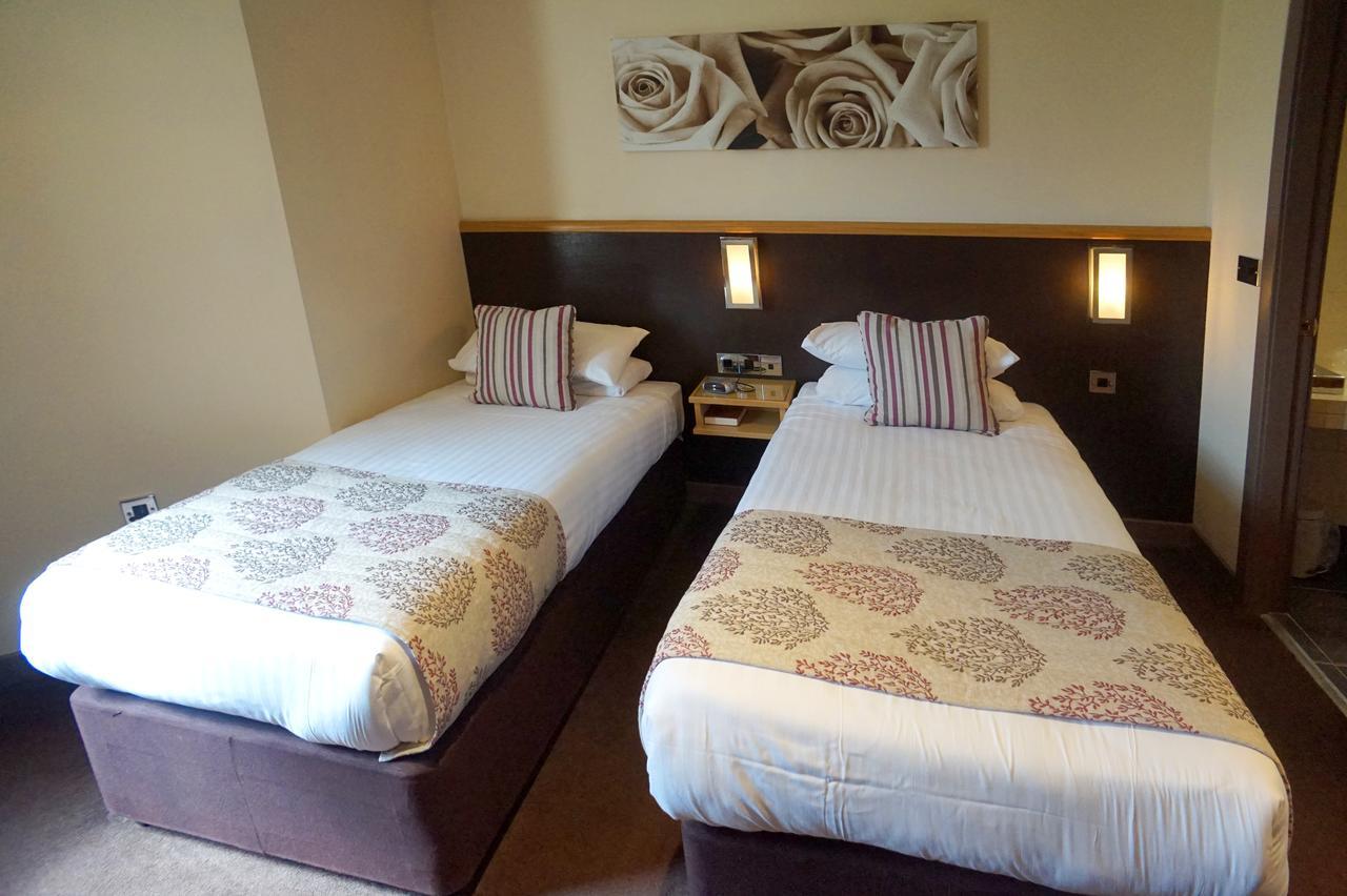 Damon'S Hotel Lincoln Esterno foto